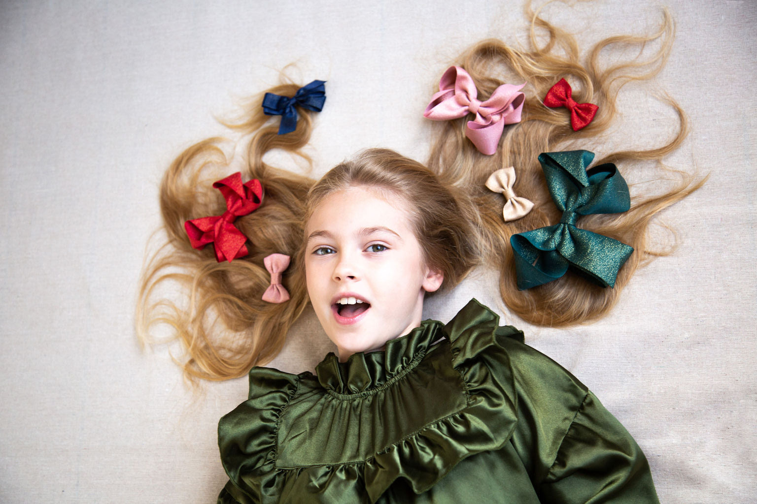 Medium Bow sparkly bow for girls in green. Perfect hair accessory for Christmas!