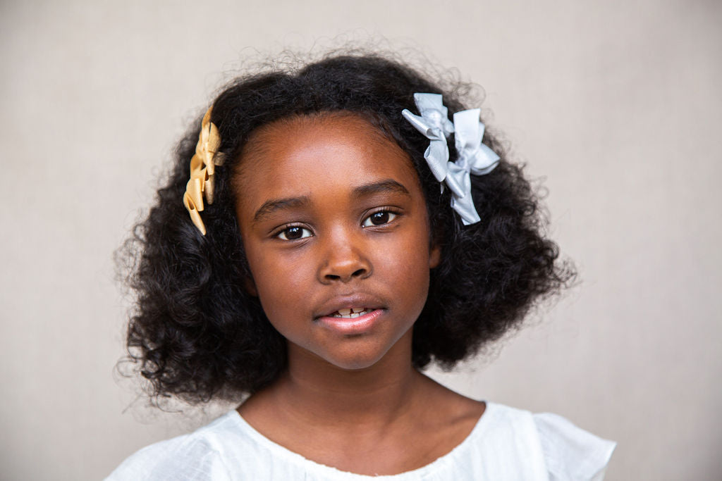 Medium Bow sparkly bow for girls in green. Perfect hair accessory for Christmas!