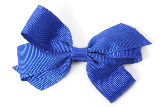Faites plaisir à votre fille avec cette barrette anti-glisse enfant à grand noeud bleu électrique.