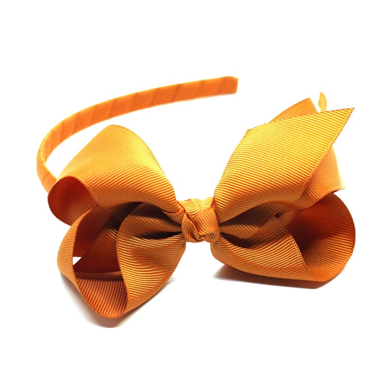 Premium Quality Bow Headband in Ginger. Oeko Tex certified gros graind ribbon. Perfect to complete an outfit or to dress up