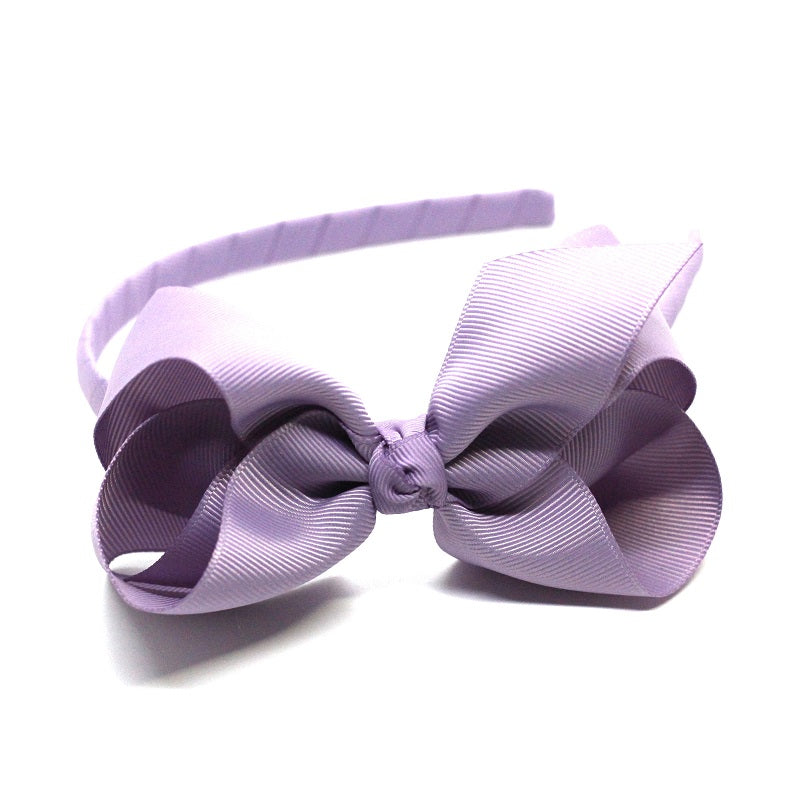 Premium Quality Bow Headband in Light Purple. Oeko Tex certified gros graind ribbon. Perfect to complete an outfit or to dress up