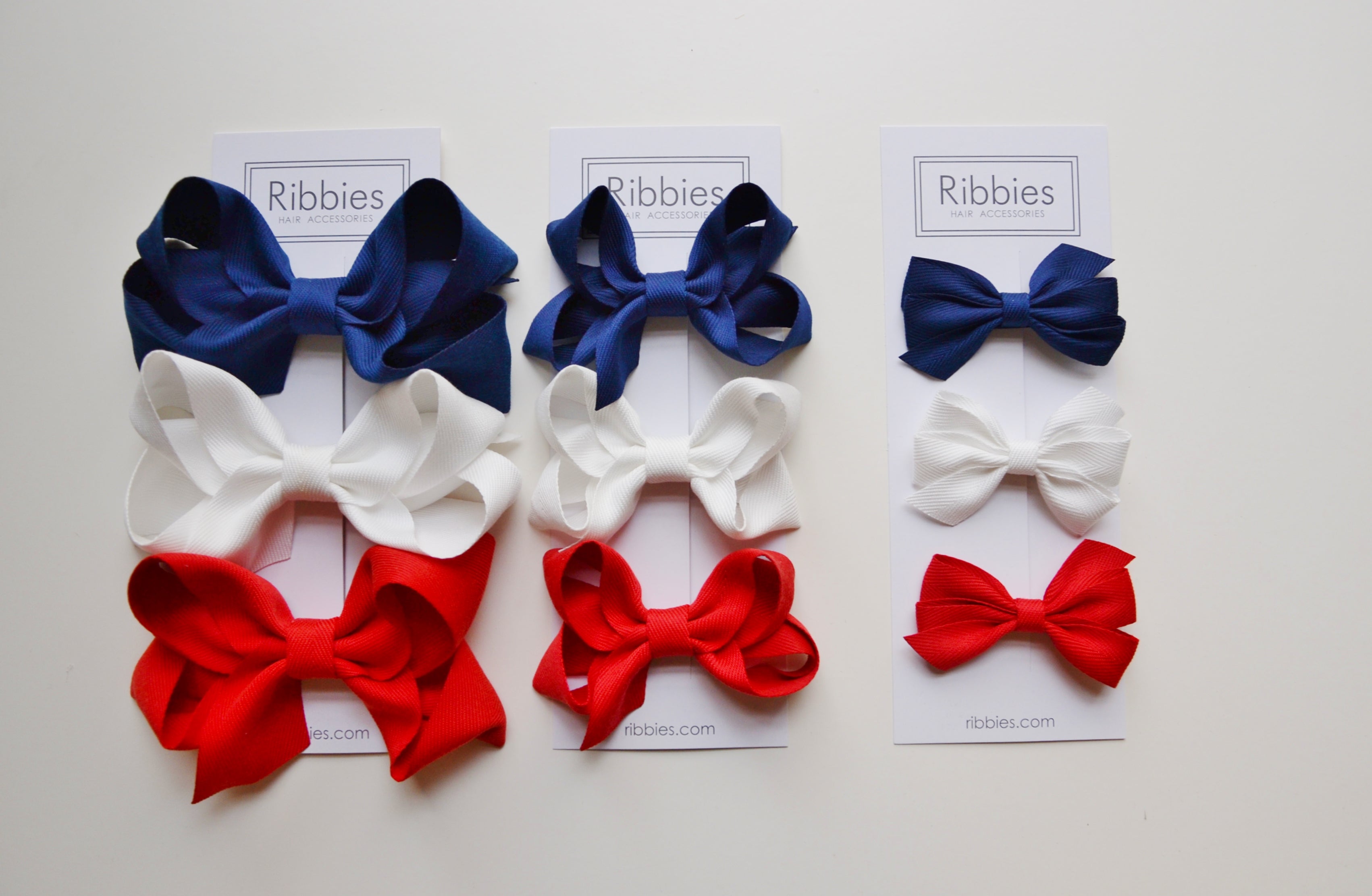 Set di 3 fiocchi tripli medi - blu navy, bianco e rosso
